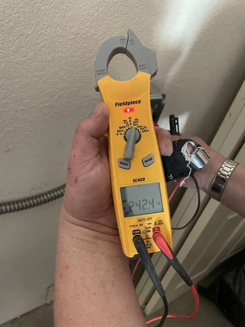 Voltage testing with clamp meter during Electrical Installation Services in Irmo